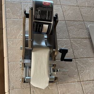 Manual Label Dispenser with White Tissue Feed - Unbranded